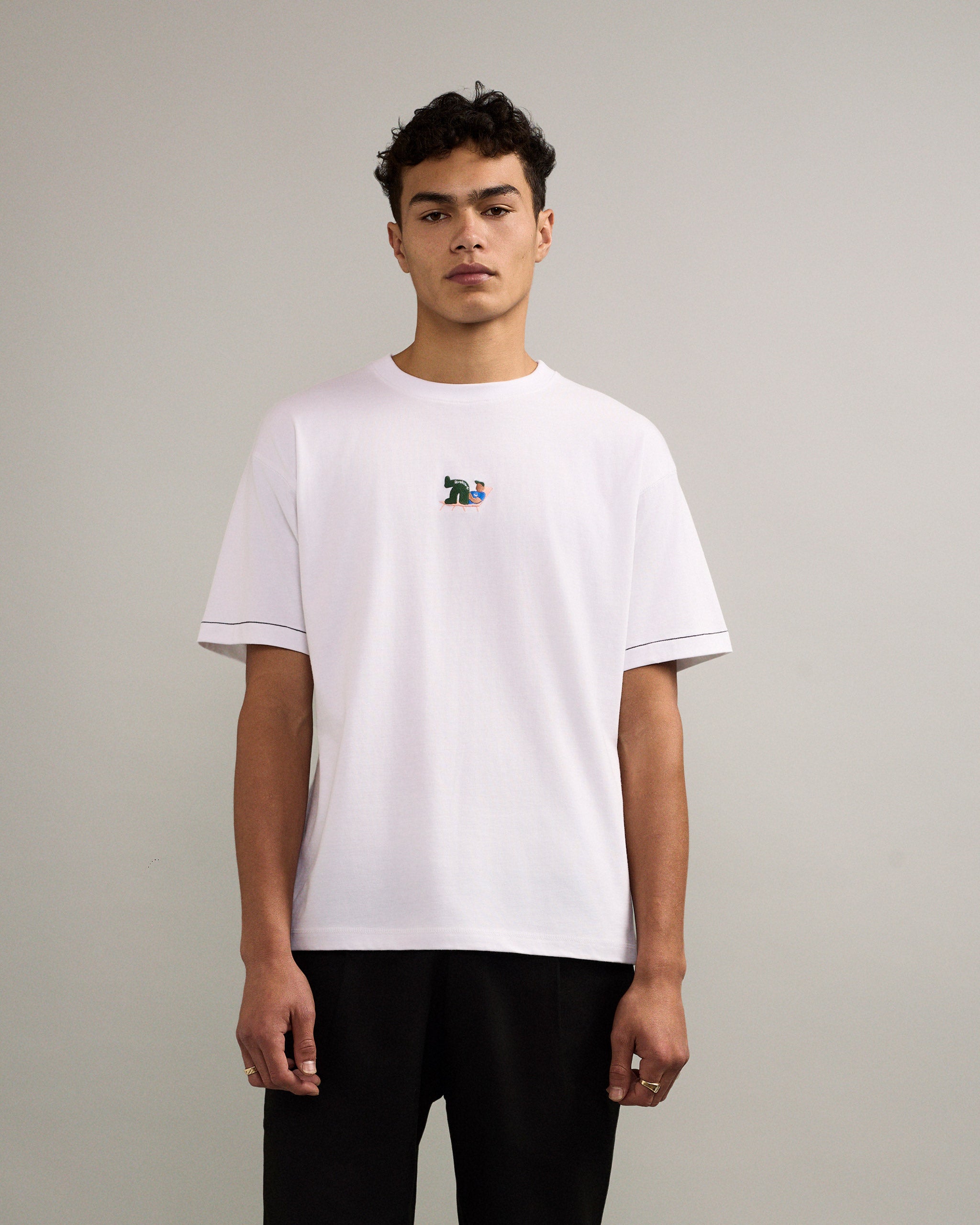Bandsome Box T-Shirt in White Lying Man - Australian made organic cotton