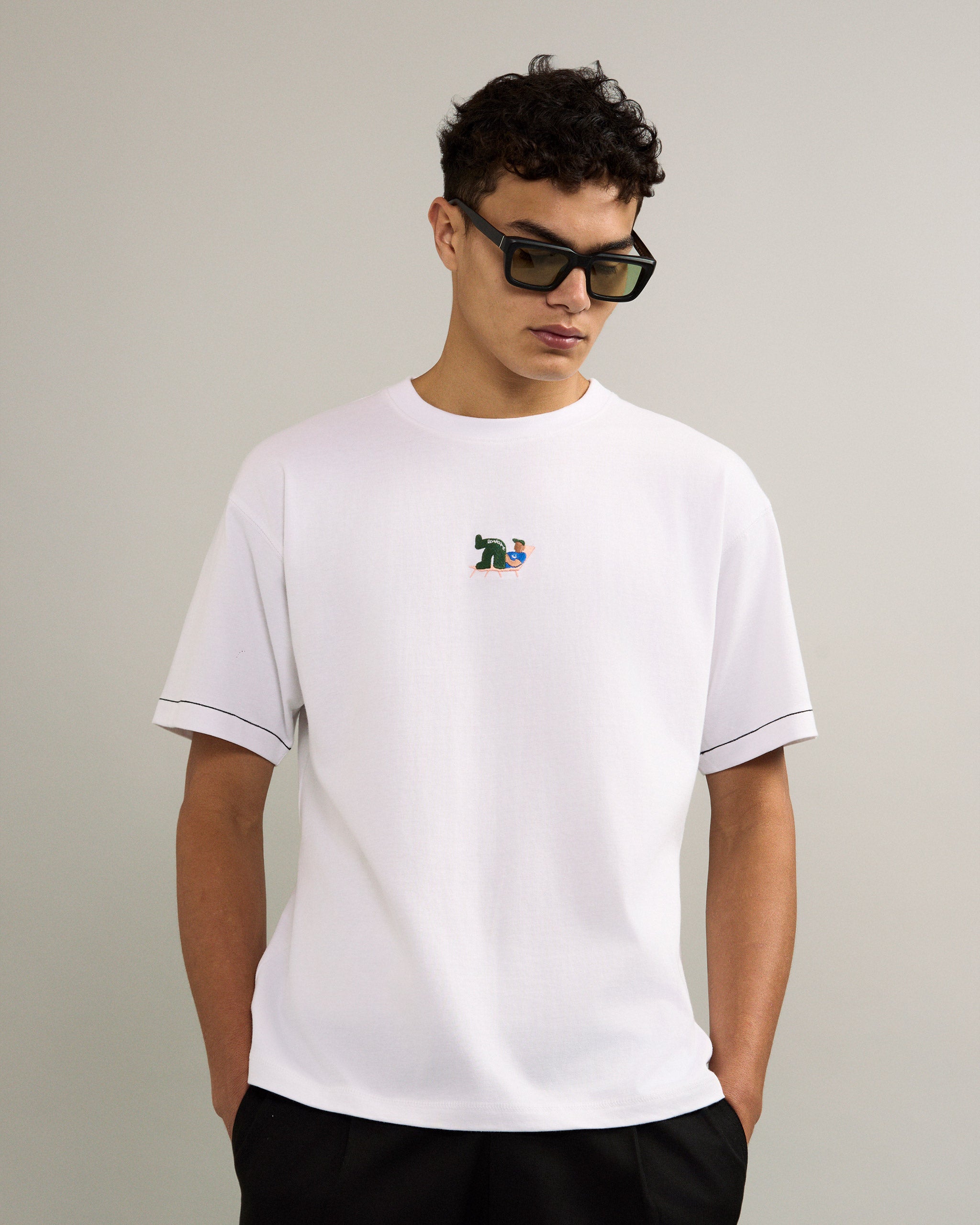 Bandsome Box T-Shirt in White Lying Man - Australian made organic cotton