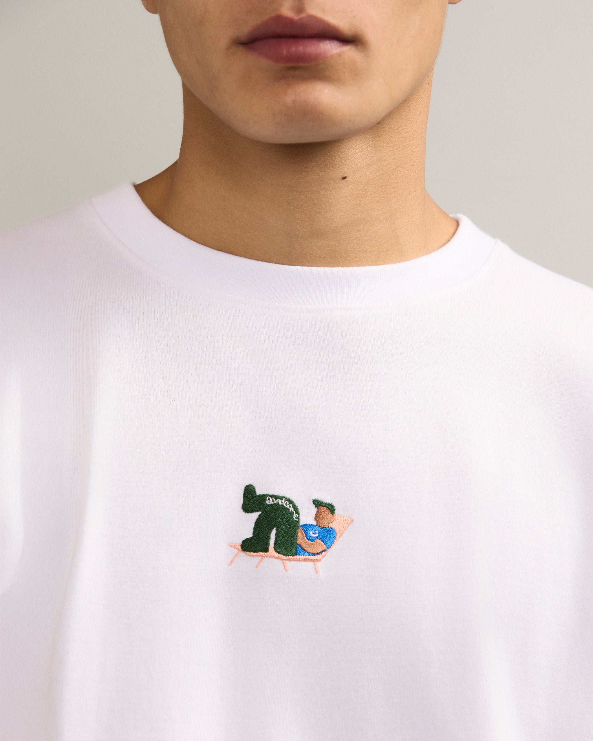 Bandsome Box T-Shirt in White Lying Man - Australian made organic cotton