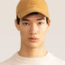 Bandsome Smiley Cap in Camel - organic cotton